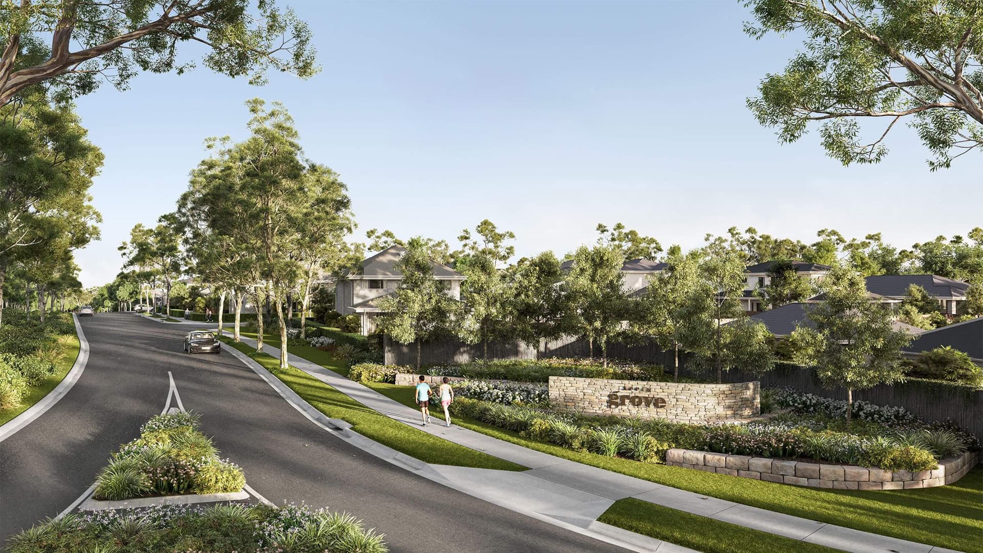A tree-lined suburban street with modern houses, landscaped gardens, and a stone sign that reads The Grove. Two people walk on the sidewalk while a car drives down the road under a clear sky.