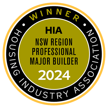 Circular gold, black, and white badge with text: Winner, HIA NSW Region Professional Major Builder 2024, Housing Industry Association.