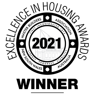 Black and white badge reading Excellence in Housing Awards, Master Builders Association, New South Wales, Australia, 2021 Winner, with a building outline in the center.