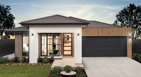 Modern single-story house with a gabled roof, large windows, a wooden front door with glass panels, brick and wood accents, a double garage, landscaped front yard, and a paved driveway. Trees and a blue sky in the background.