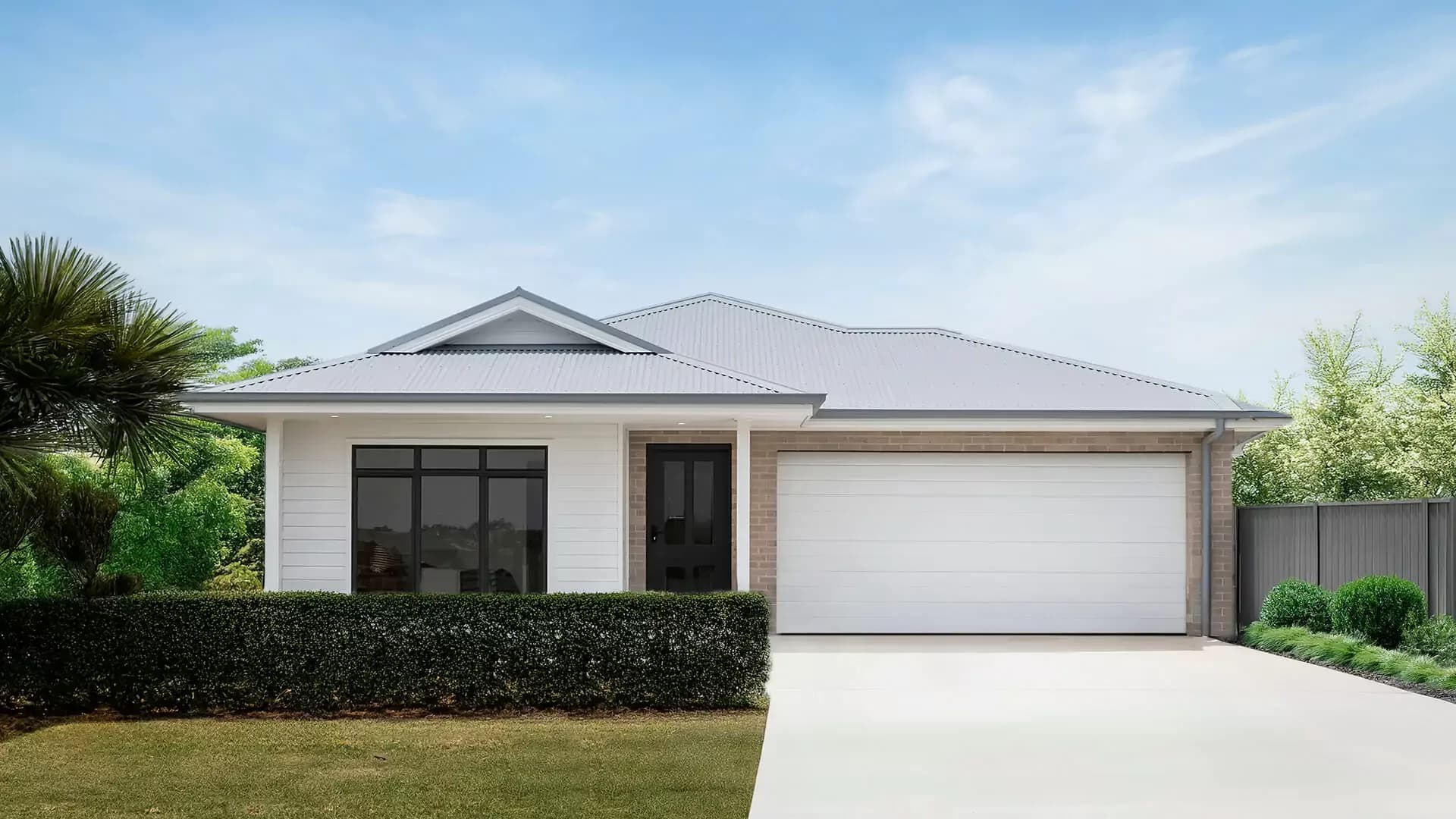 A modern single-story house with a grey roof, white exterior, large front windows, double garage, black front door, trimmed hedges, and a neatly manicured lawn under a blue sky.