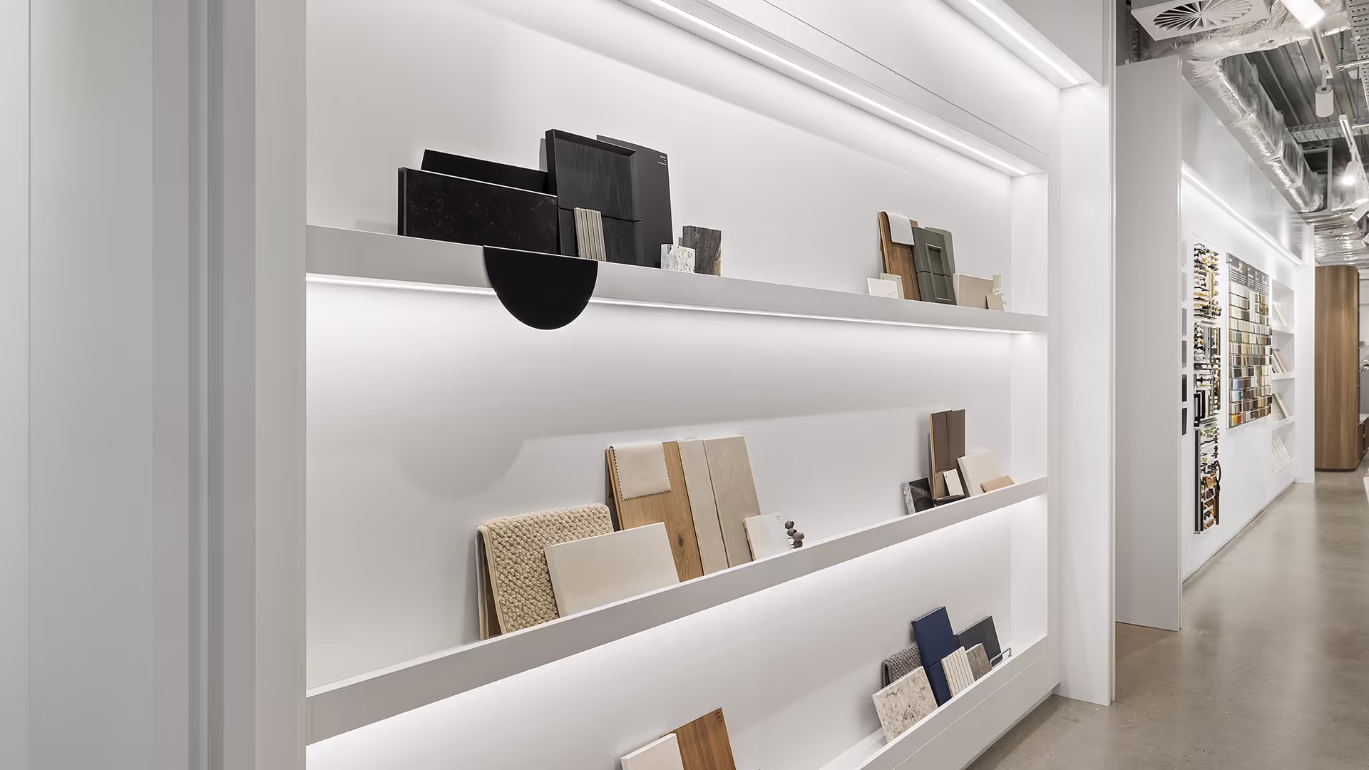 A shelf inside a design studio showcasing colours swatches